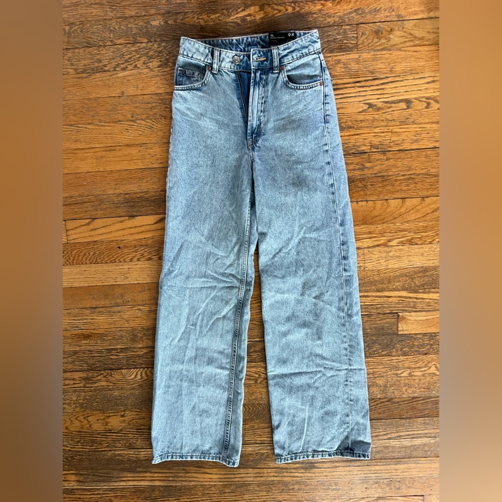 Divided Brand. NWT. High waisted, wide leg white wash jeans.